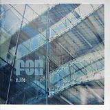 glass facade with reflections and lettering